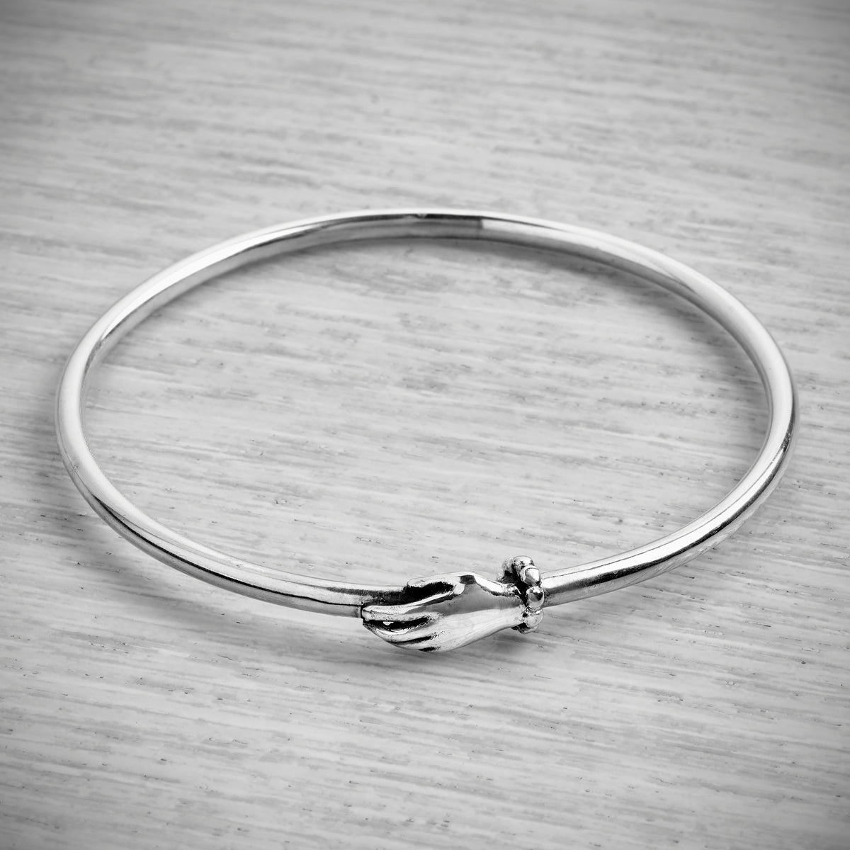 Tiny Hand Solid Bangle by Emma White