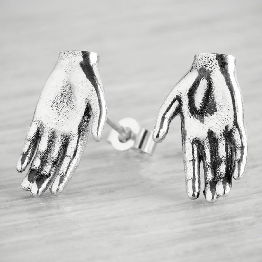 Tiny Hand Stud Earrings by Emma White