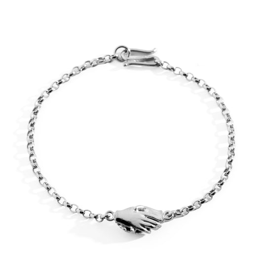 Silver Clasped Hands Bracelet by Emma White
