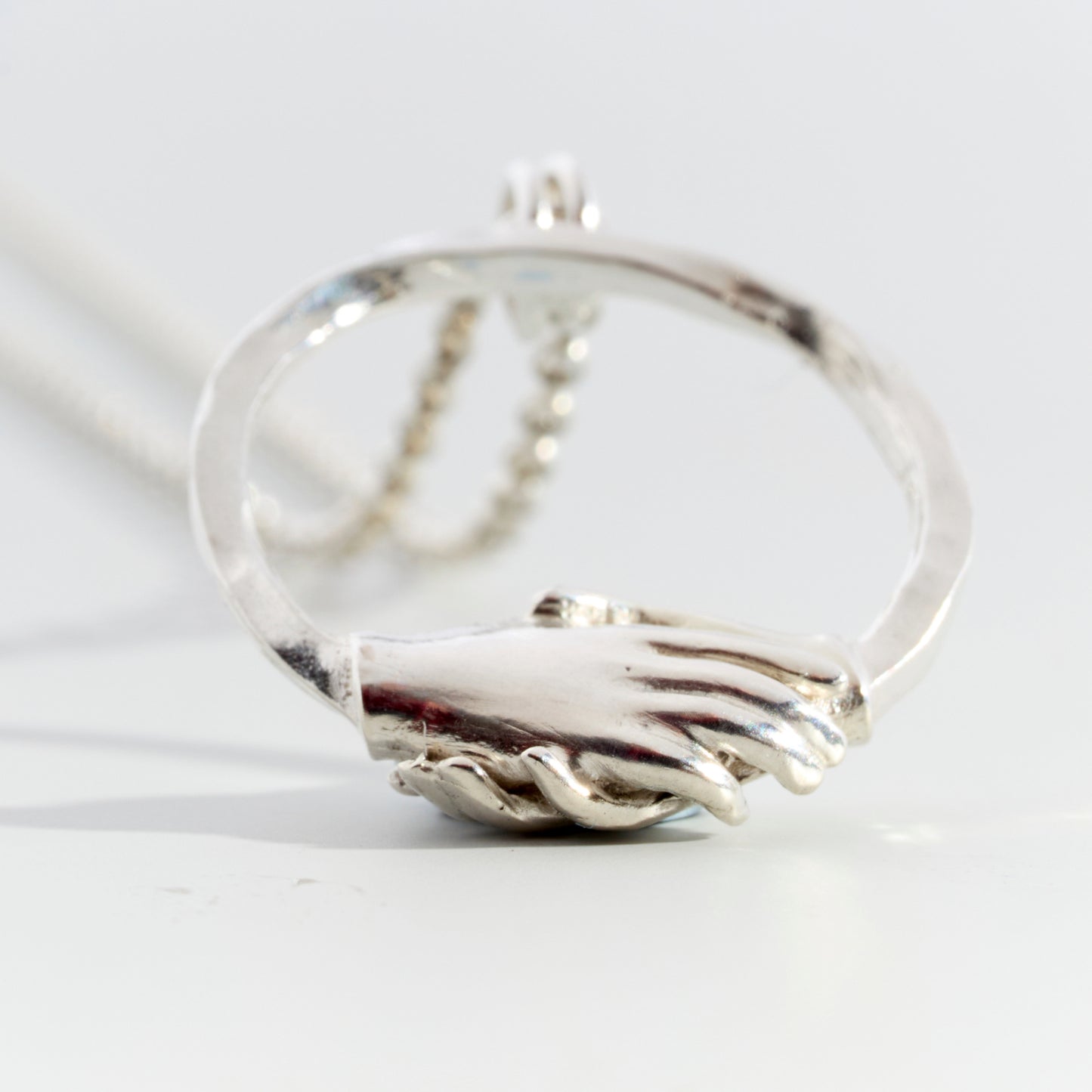 Silver Small Clasped Circle Necklace by Emma White