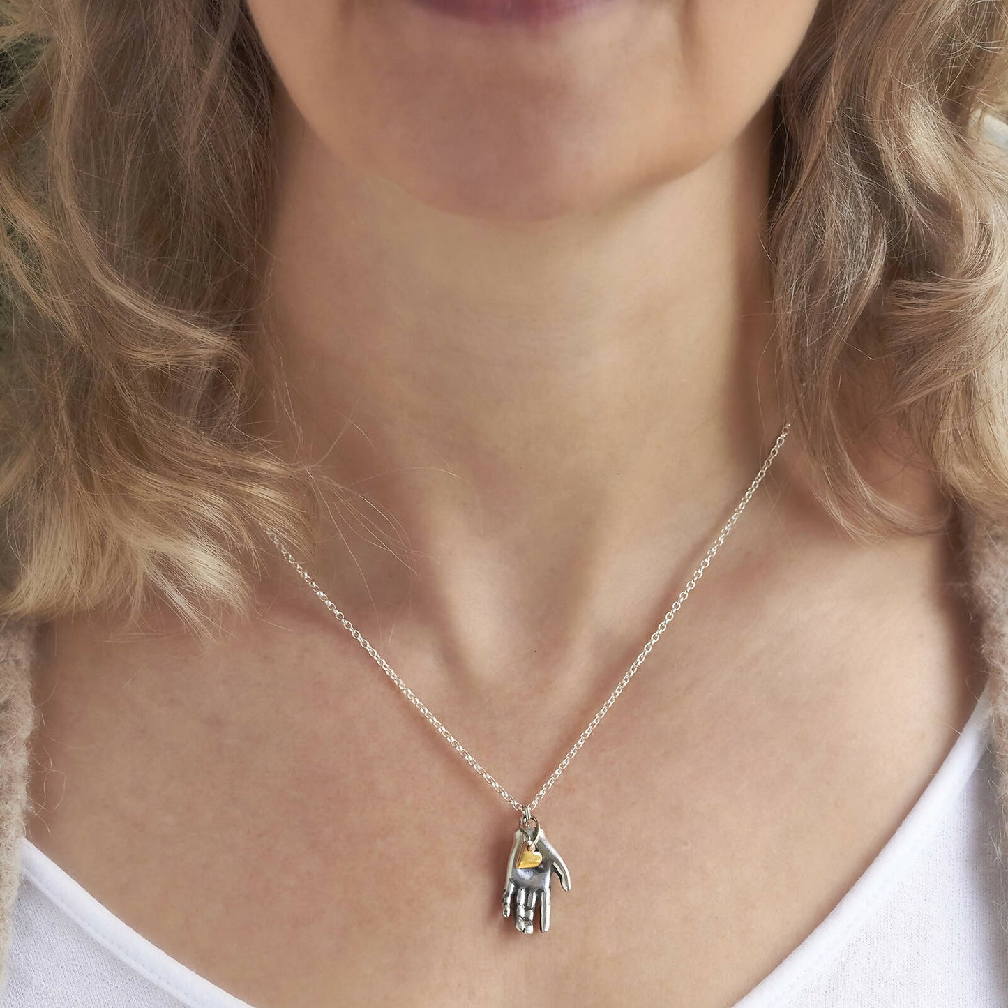 Gold Heart in Hand Necklace by Emma White