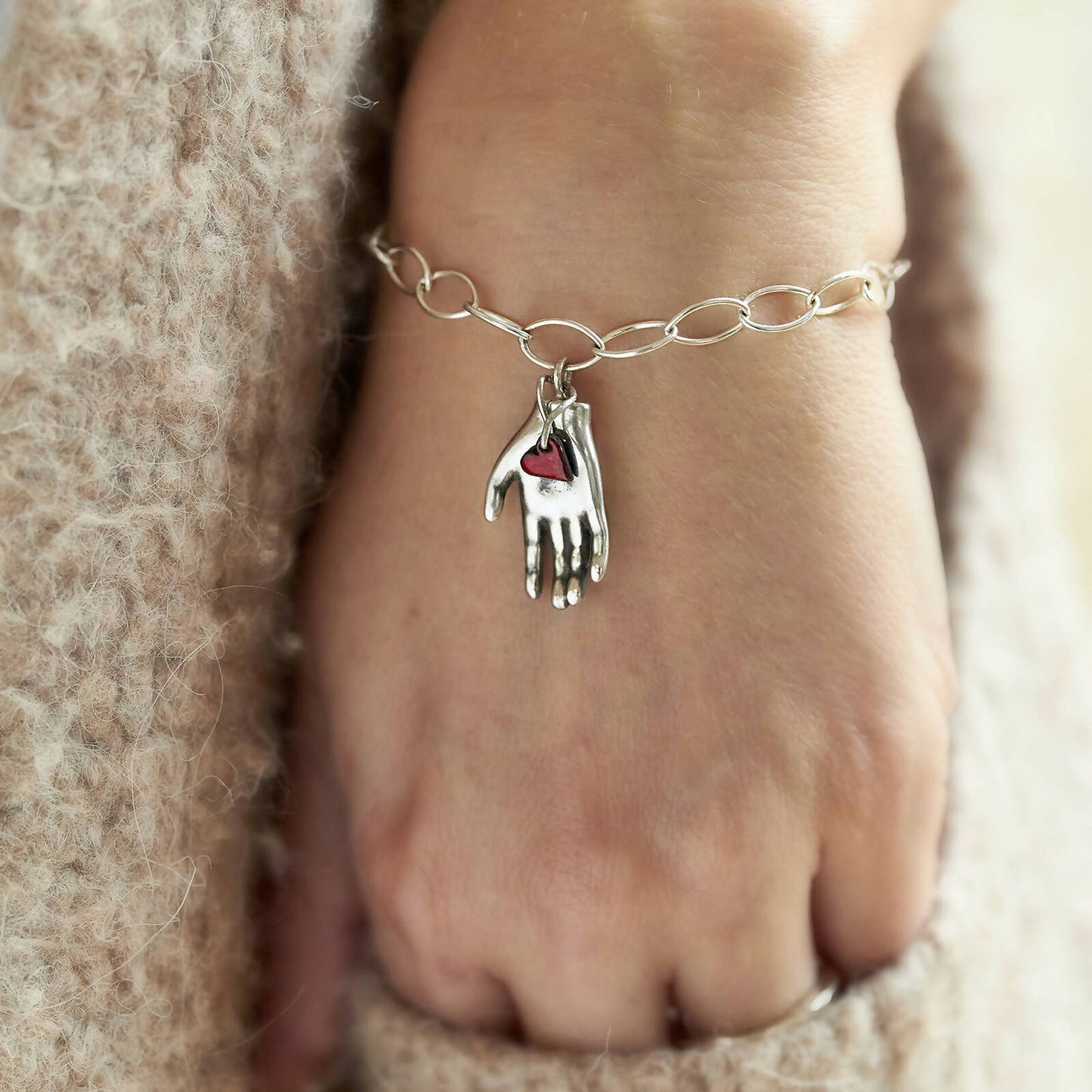 Red Heart in Hand Bracelet by Emma White