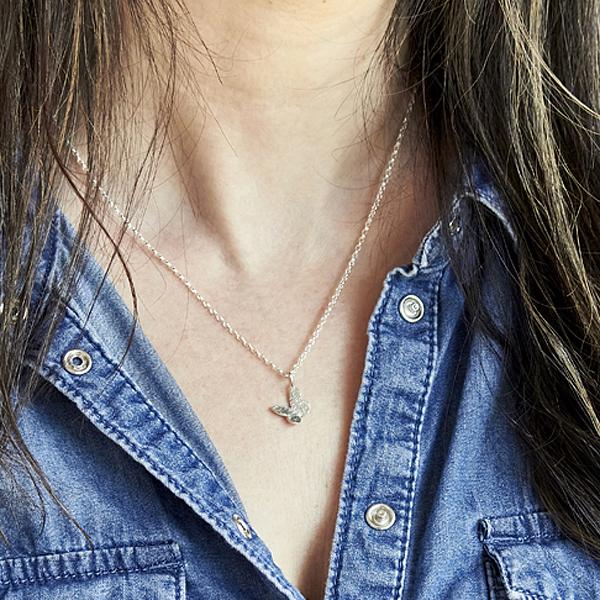 handmade Silver butterfly necklace, worn on with denim shirt by Emma White-1