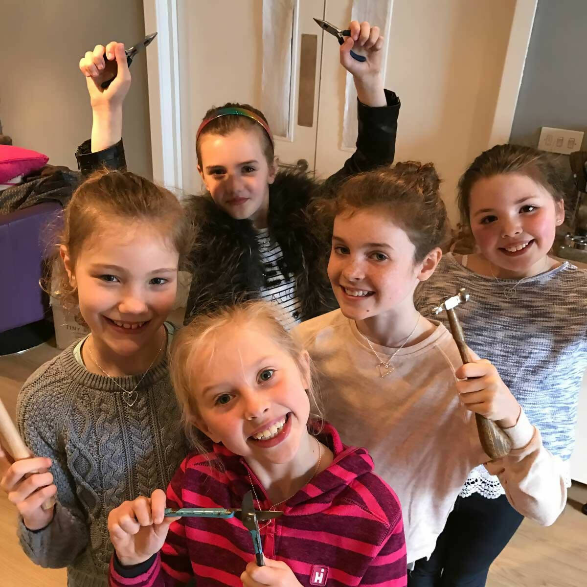 Birthday Party - Make a silver heart pendant.