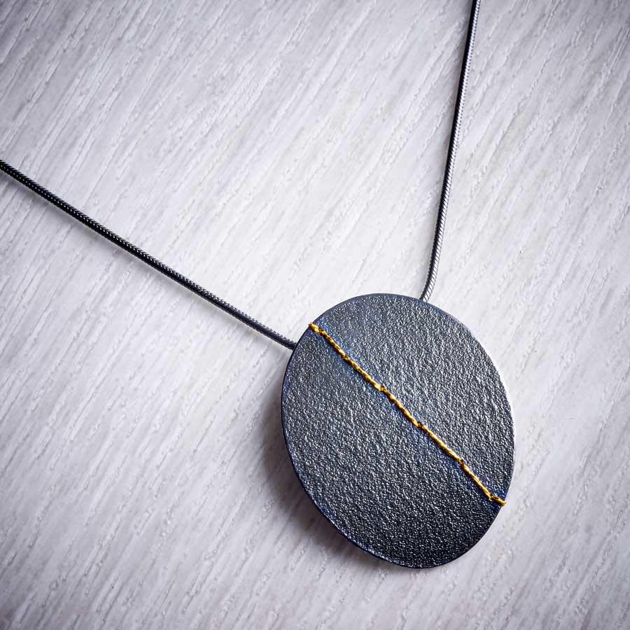 Large Oxidised (Black) Silver Oval Necklace sewn with Gold thread by Sara Bukumunhe-1