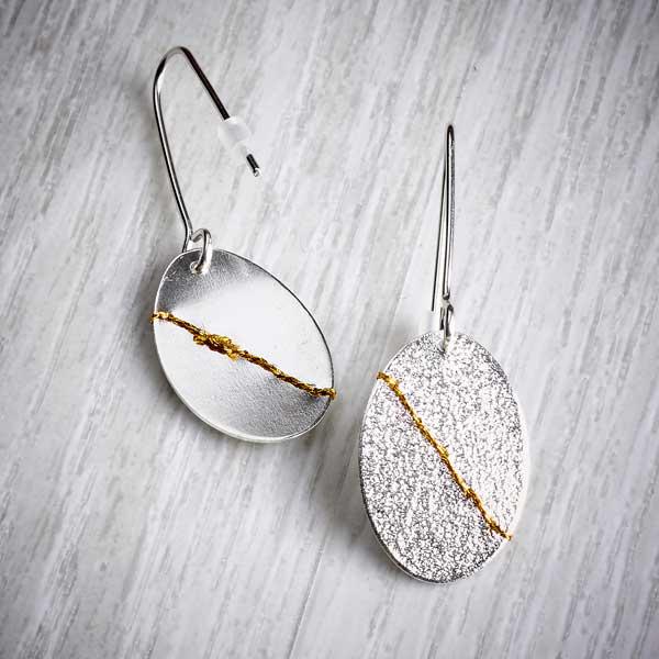 Silver Dangly Earrings Sewn with Gold Thread by Sara Bukumunhe. Image property of THE JEWELLERY MAKERS.-2