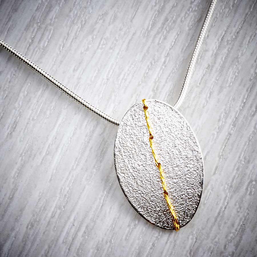 Small Oval Necklace sewn with Gold thread by Sara Bukumunhe-0