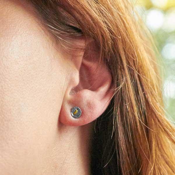 Small Round Oxidised Silver Studs sewn with gold thread by Sara Buk worn on woman with red hair-2