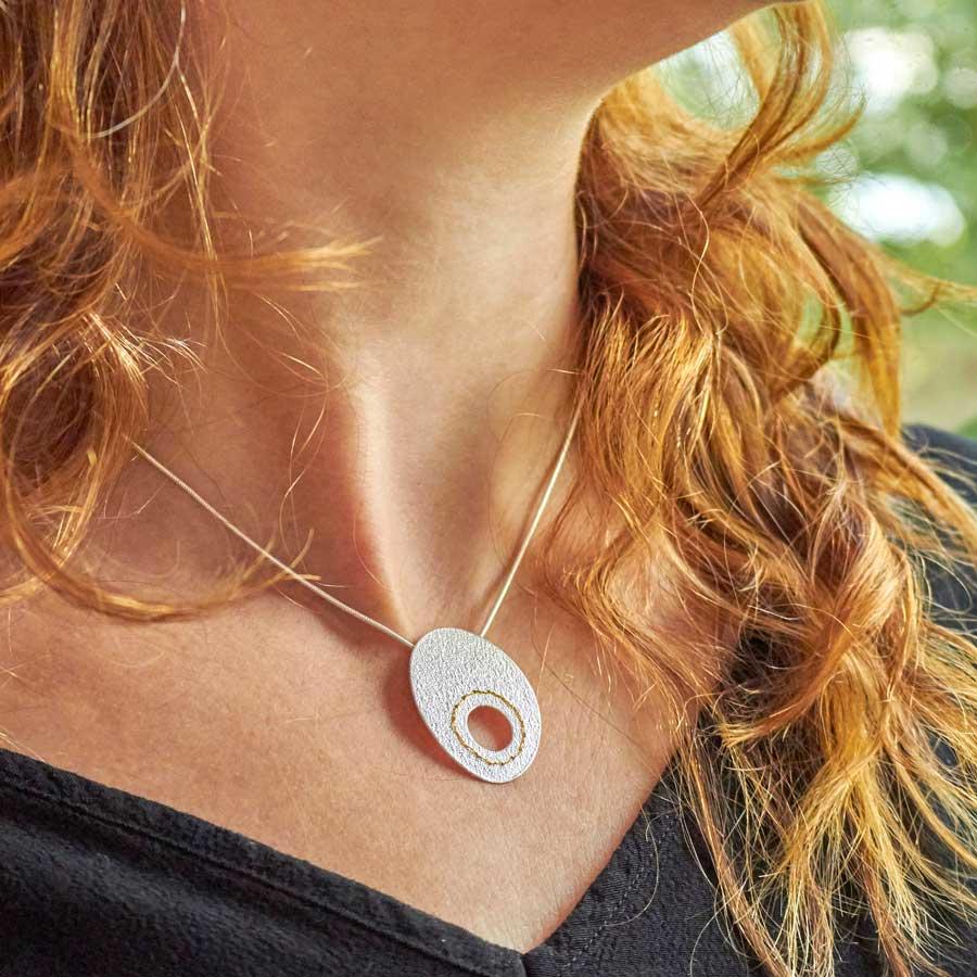 Silver Cut-out Circle Necklace sewn with Gold thread by Sara Bukumunhe-3