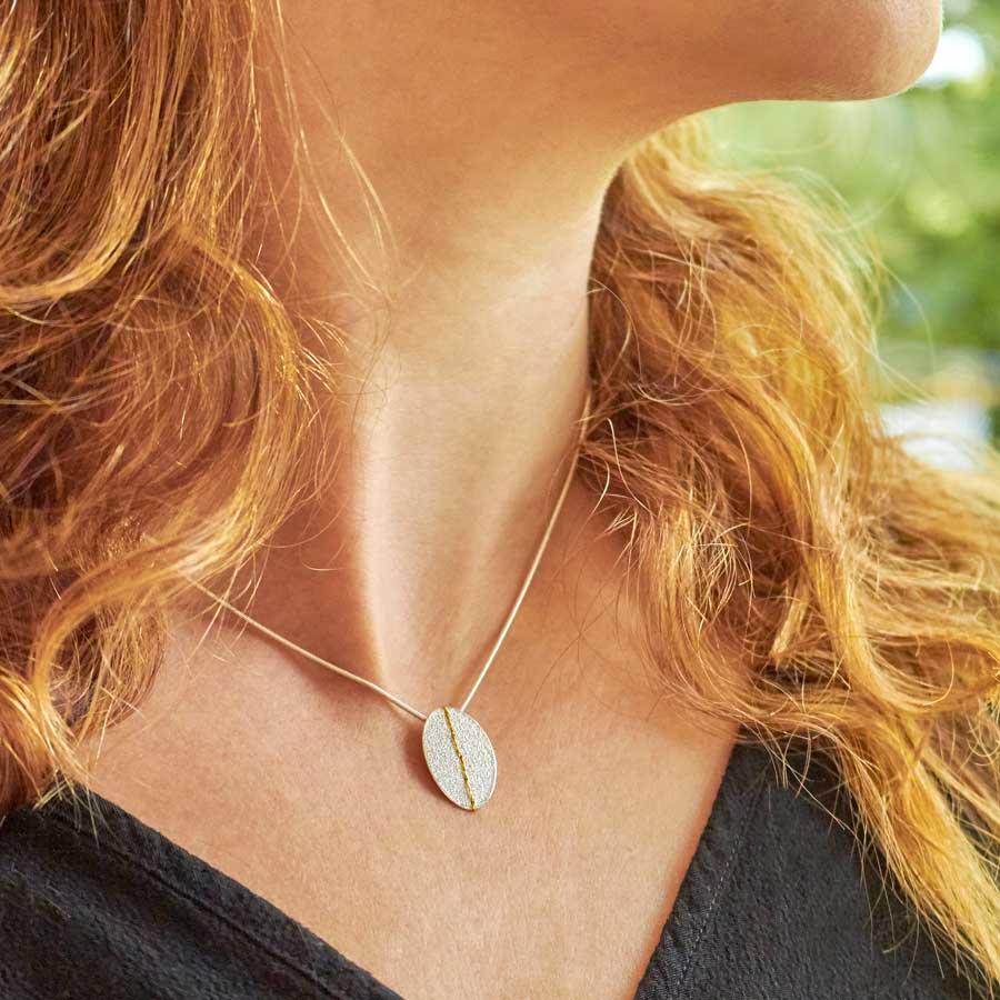 Small Oval Necklace sewn with Gold thread by Sara Bukumunhe-1