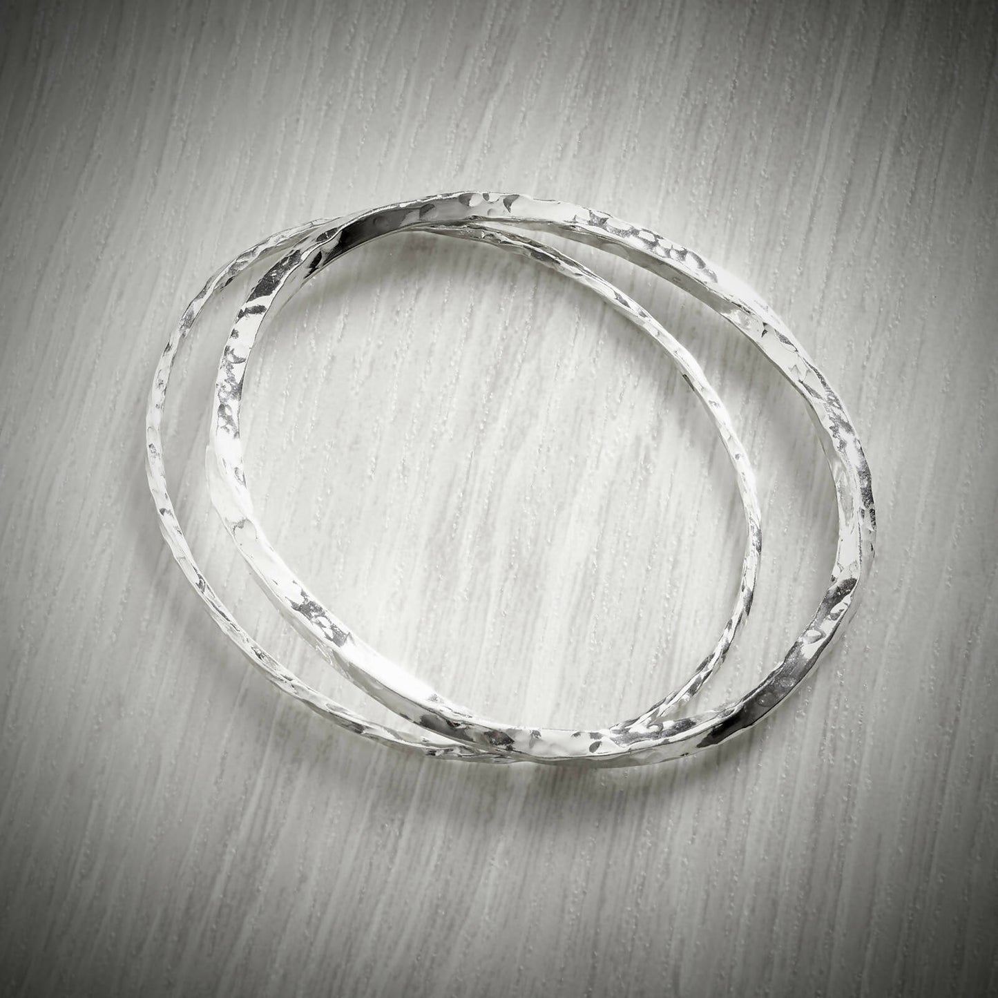 Slimline Twisted Bangle by Emma White