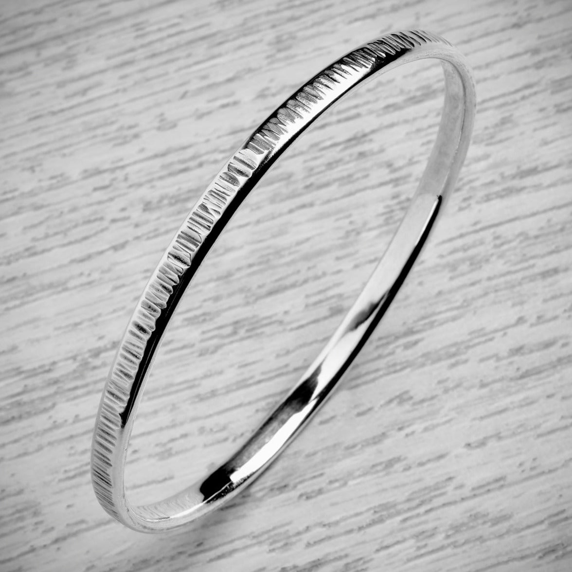 Sturdy Stacked Hammered Lines Bangle by Emma White