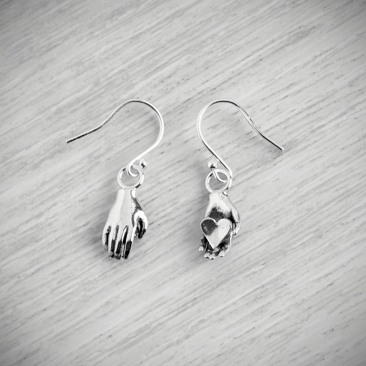 Tiny Heart in Hand Hook Earrings by Emma White