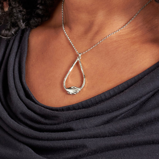 Silver Large Clasped Teardrop Necklace by Emma White