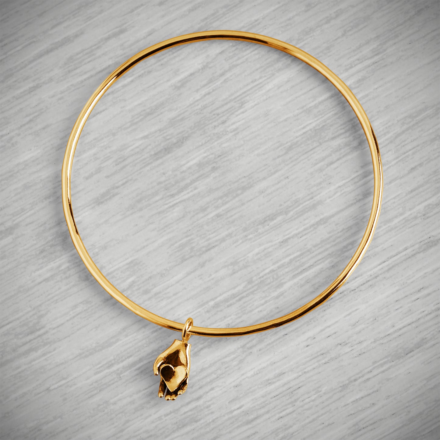 Gold Vermeil Tiny Heart in Hand Bangle by Emma White