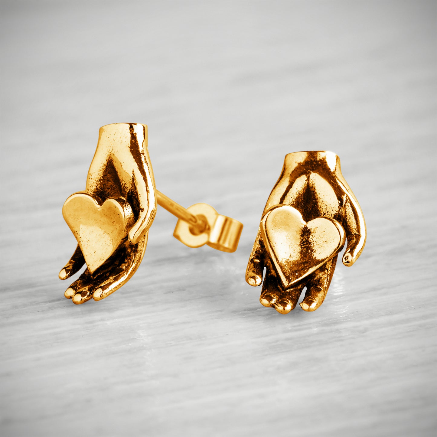 Gold Vermeil Tiny Heart in Hand Stud Earrings by Emma White