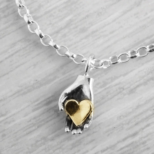 Tiny Heart in Hand Bracelet by Emma White
