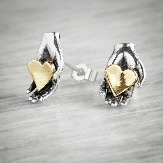 Tiny Heart in Hand Stud Earrings by Emma White