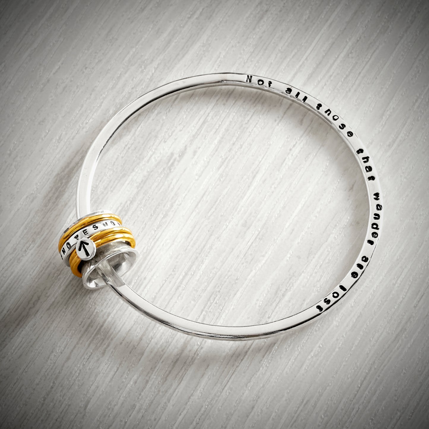 The YES/NO Spinning Bangle by Emma White
