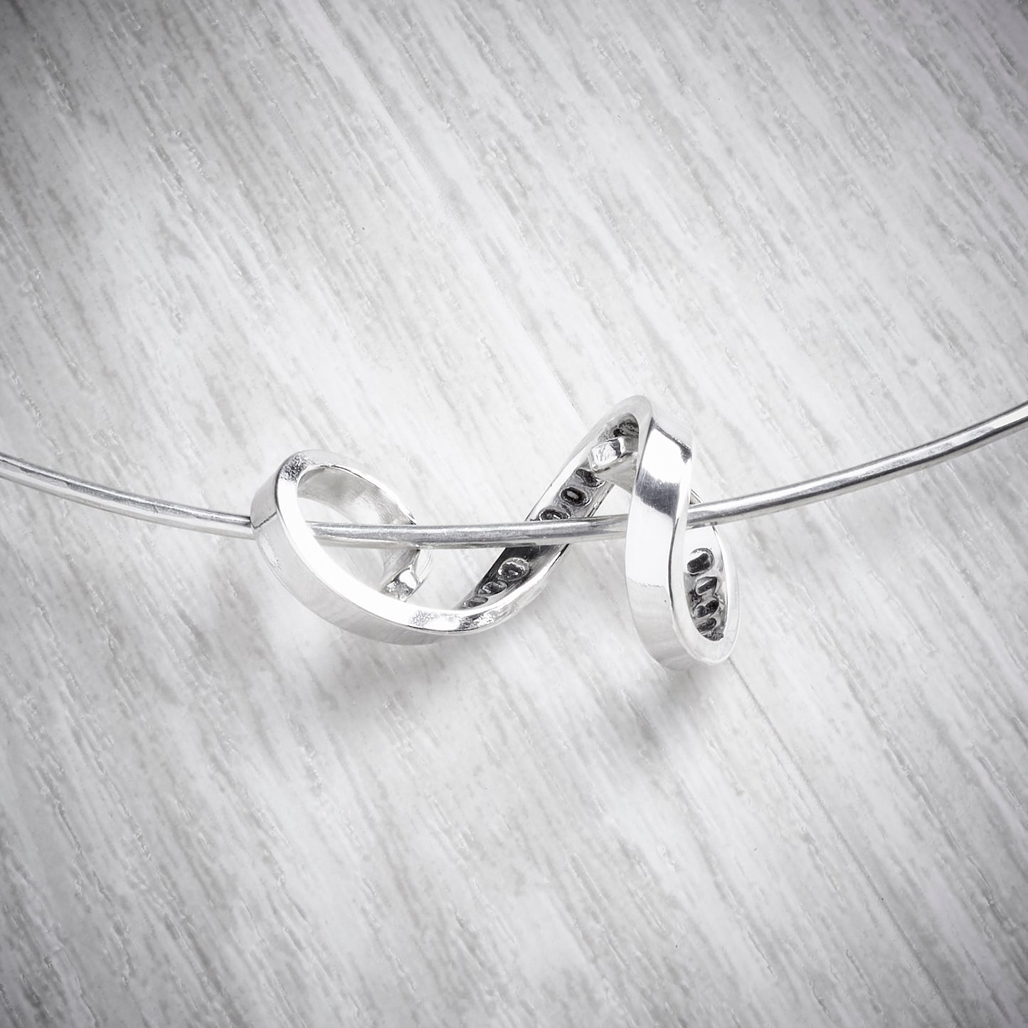 Silver Personalised Tangled Words Necklace on Slim Torque by Emma White