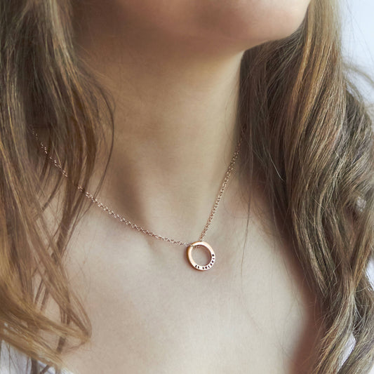 Solid Rose Gold Circle Pendant on a gold chain by Emma White