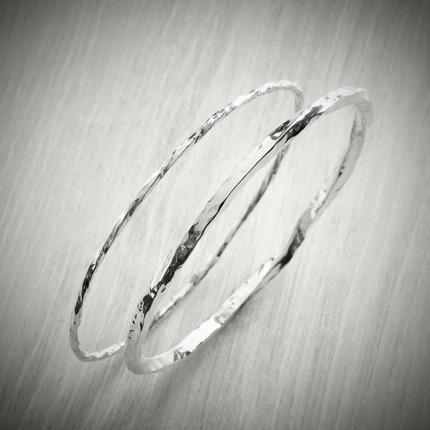 Slimline Twisted Bangle by Emma White