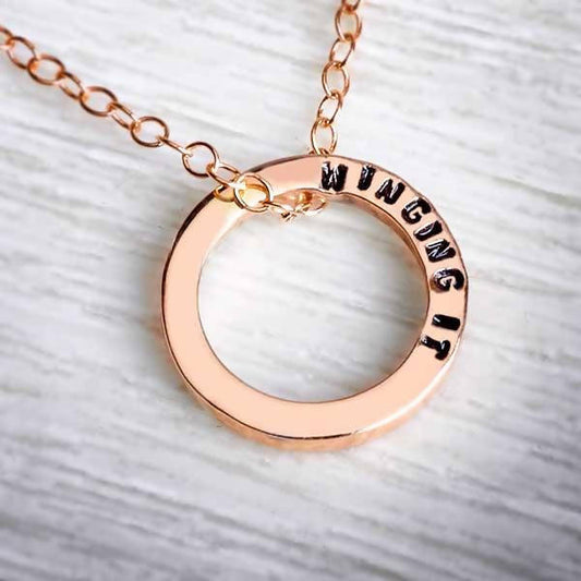 Solid Rose Gold Circle Pendant on a gold chain by Emma White