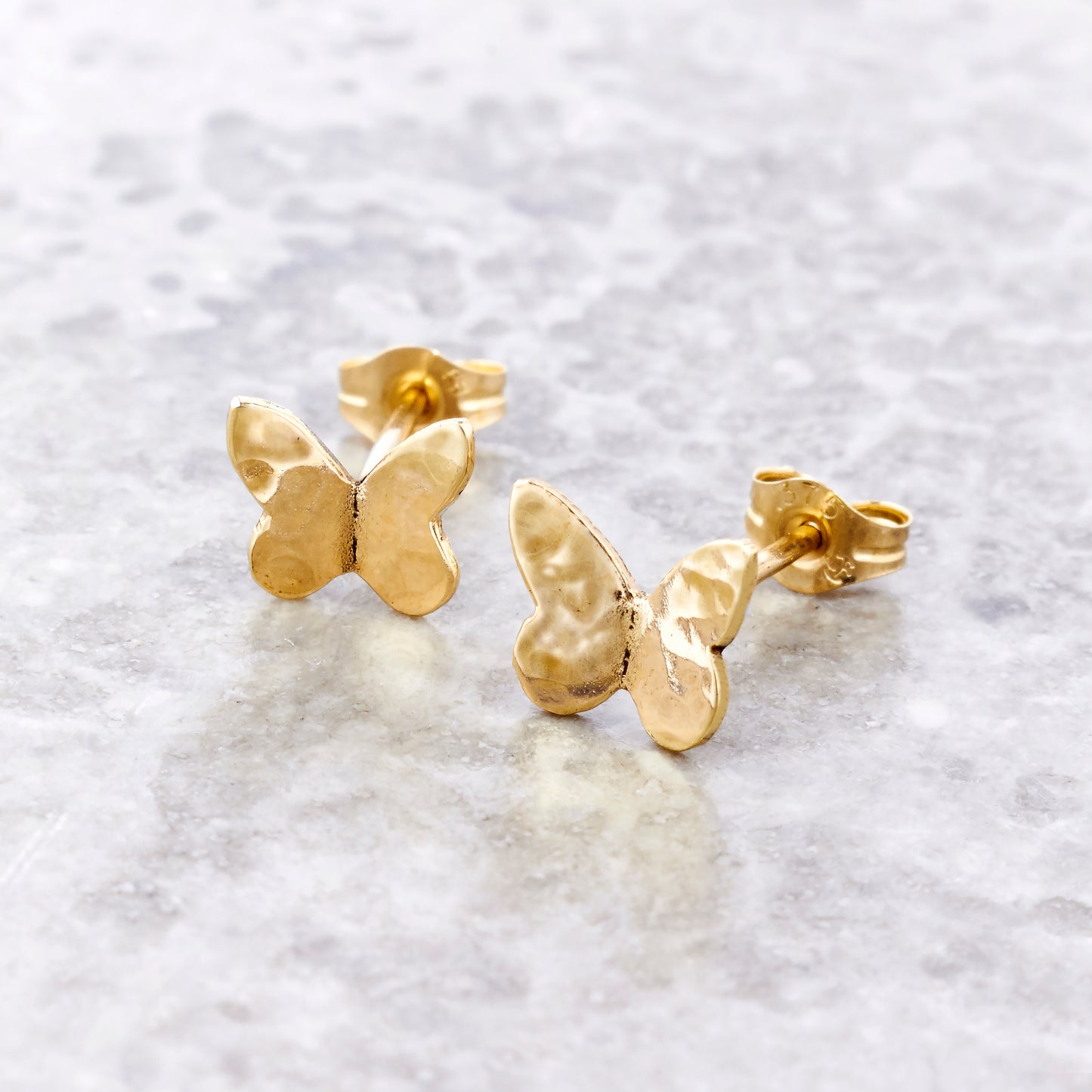 Solid Gold Tiny Butterfly Earrings by Emma White