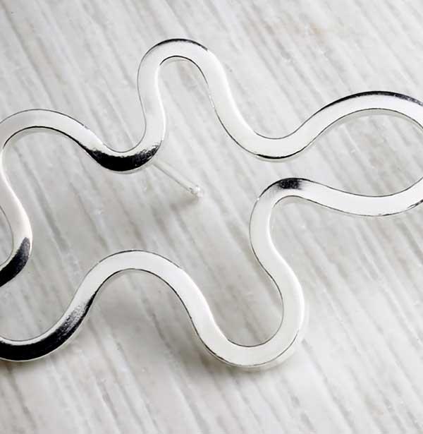 Silver abstract handmade studs Cropped Shot by Alice Chandler. Image property of THE JEWELLERY MAKERS.-3