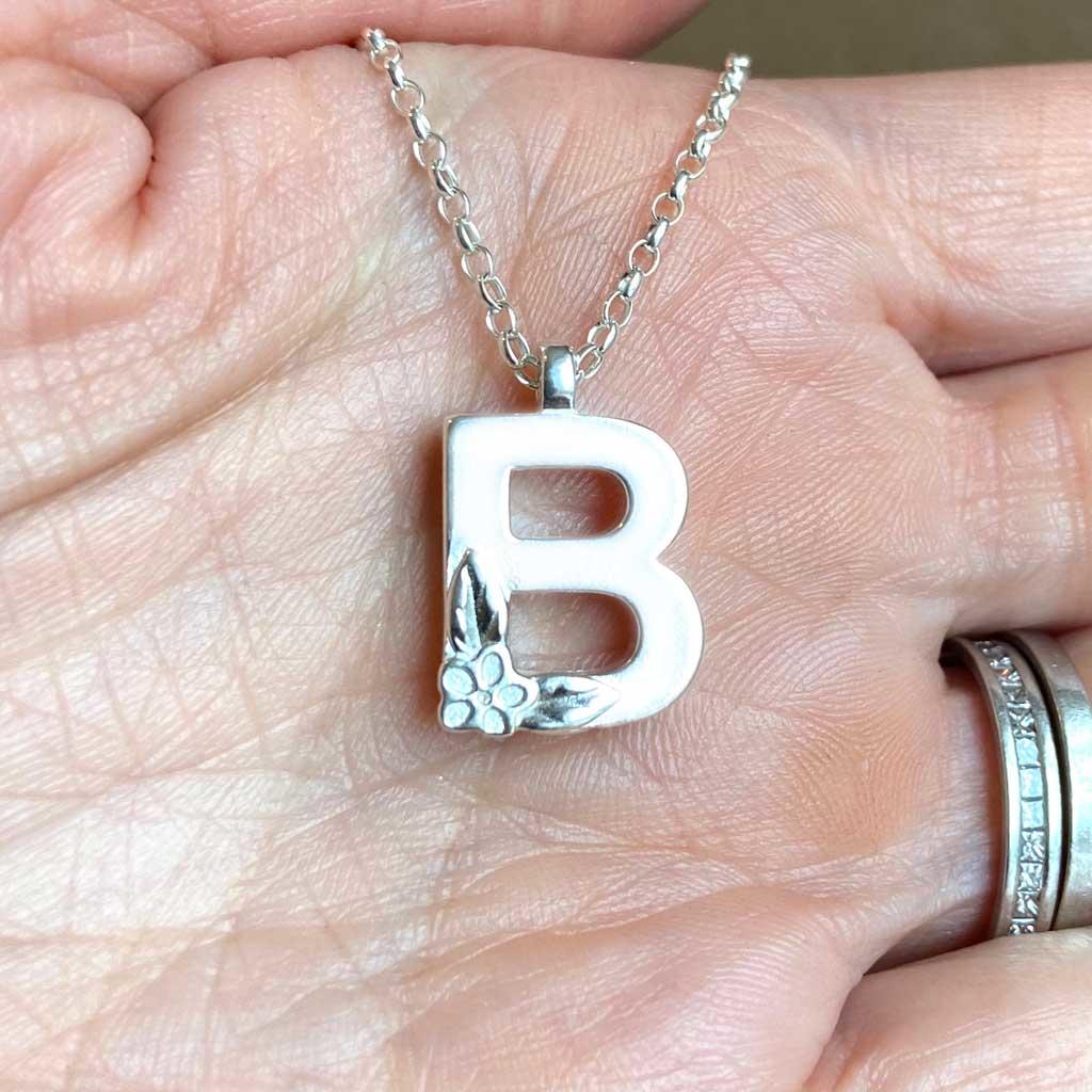 Silver Letter Necklace - B by Elin Mair, Image property of THE JEWELLERY MAKERS in hand-2