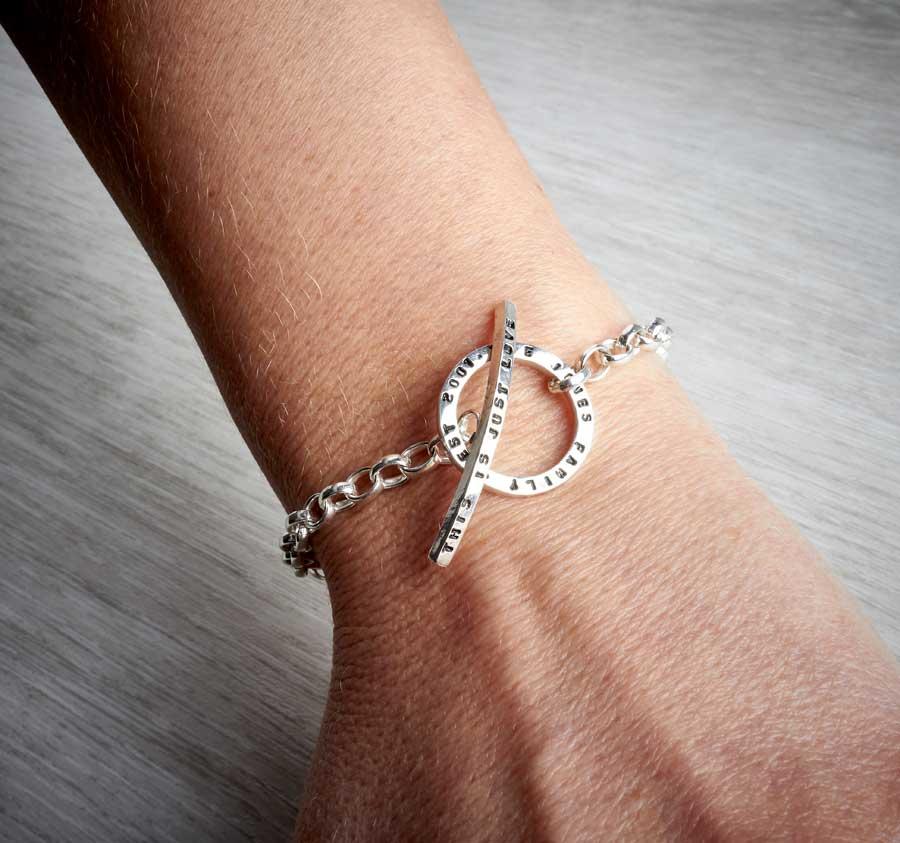 handmade personalised silver toggle bracelet on arm-0
