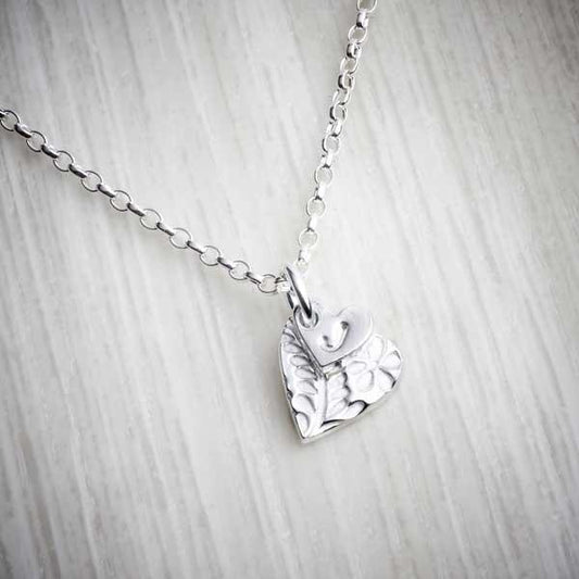 Silver Clay Personalised Small Floral Heart Necklace by Elin Mair. Image property of THE JEWELLERY MAKERS.-0