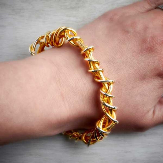 handmade gold vermeil torque bangle with gold vermeil twist detail on wrist-1