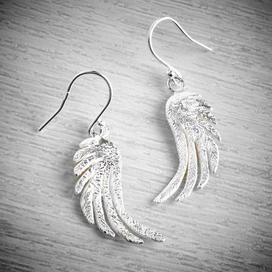 silver angel wing drop earrings  by Fi Mehra available from the jewellery makers, image property of EMMA WHITE-0