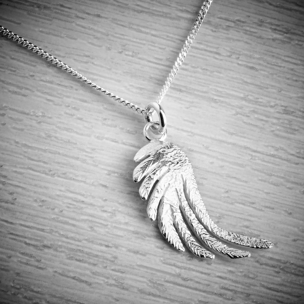 large silver angel wings pendant by Fi Mehra, available from THE JEWELLERY MAKERS, Image property of EMMA WHITE-0