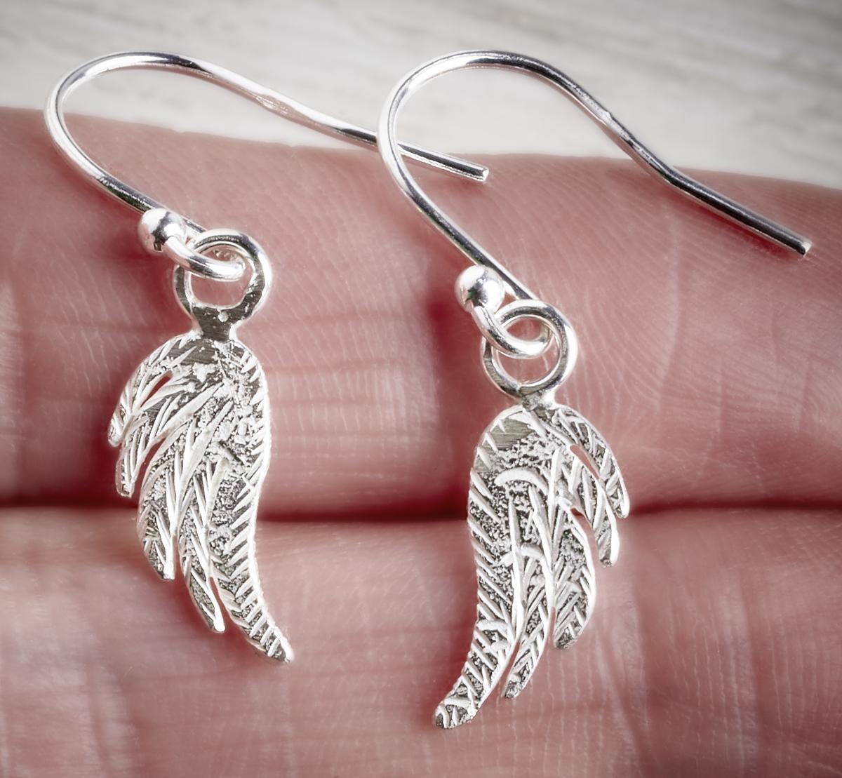 silver angel wings drop earrings by Fi Mehra, available from the jewellery makers, image property of EMMA WHITE-1