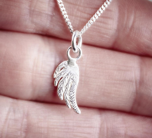small silver angel wings pendant by Fi Mehra, available from the jewellery makers, image property of EMMA WHITE-1
