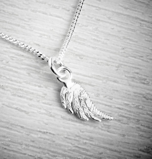 small silver angel wings pendant by Fi Mehra, available from the jewellery makers, image property of EMMA WHITE-0