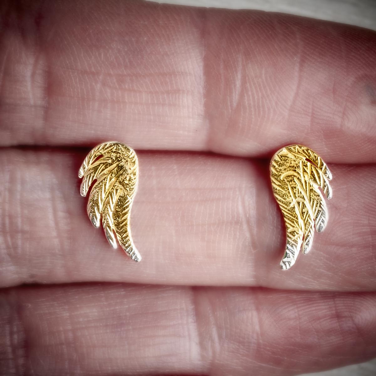 silver and gold angel wing stud earrings by Fi Mehra available from the jewellery makers, IMAGE property of EMMA WHITE-2