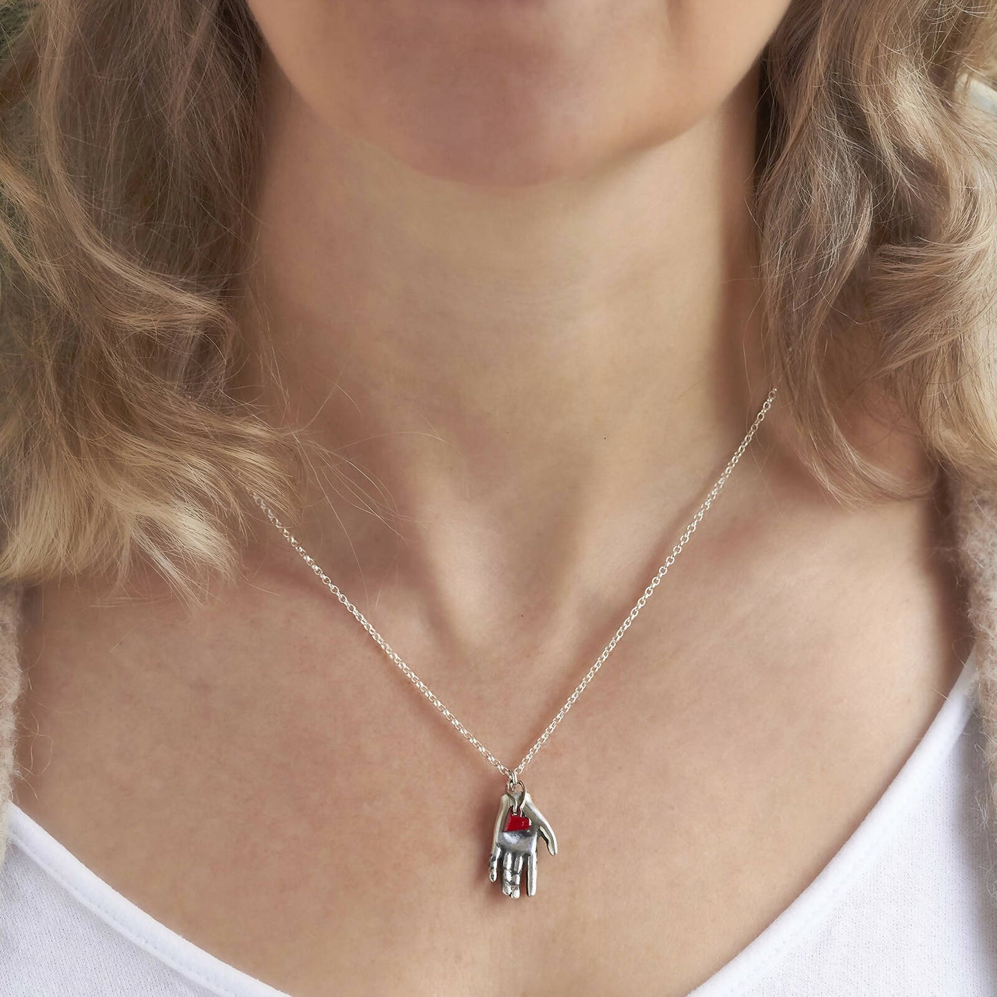 Red Heart in Hand Necklace by Emma White