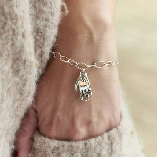 Gold Heart in Hand Bracelet by Emma White