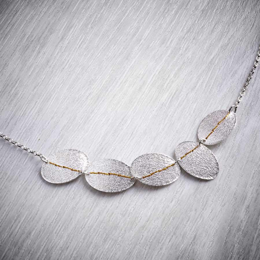 5 Silver Pebbles, A Necklace Sewn with Gold Thread by Sara Bukumunhe-2