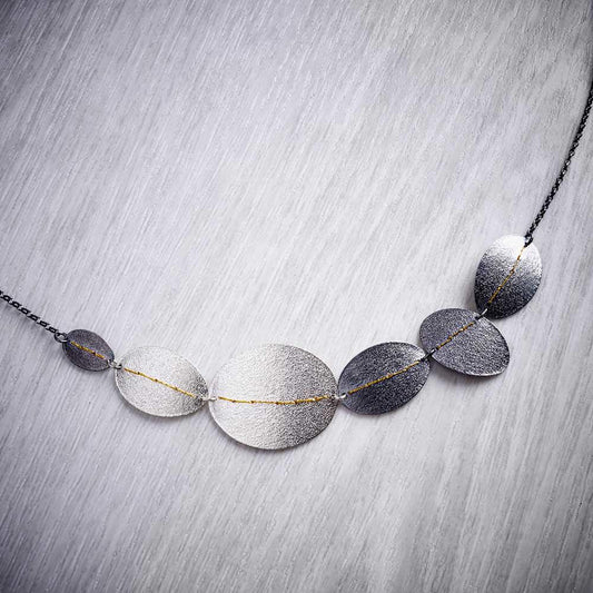 Oxidised (Black) and (White) Silver Assorted Disc Necklace sewn with Gold thread by Sara Bukumunhe-1