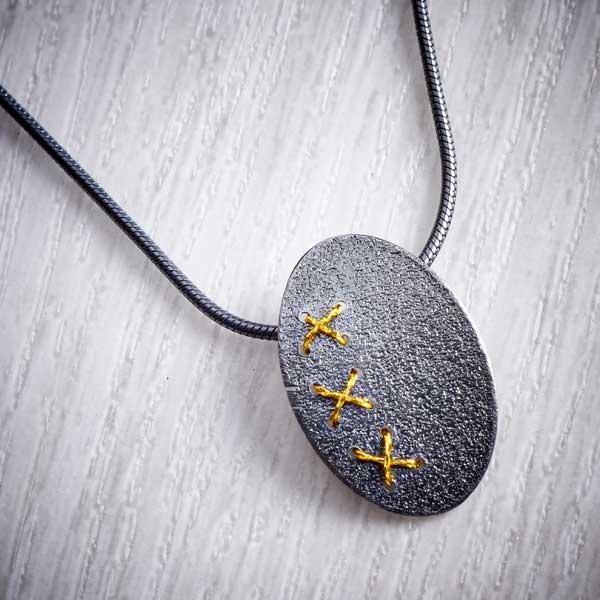 Oxidised (Black) Silver Oval cross-stitch Necklace with Gold thread by Sara Bukumunhe-0