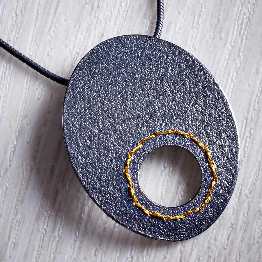 Oxidised (Black) Silver Cut-out circle Necklace sewn with Gold thread by Sara Bukumunhe (SUNH)-1