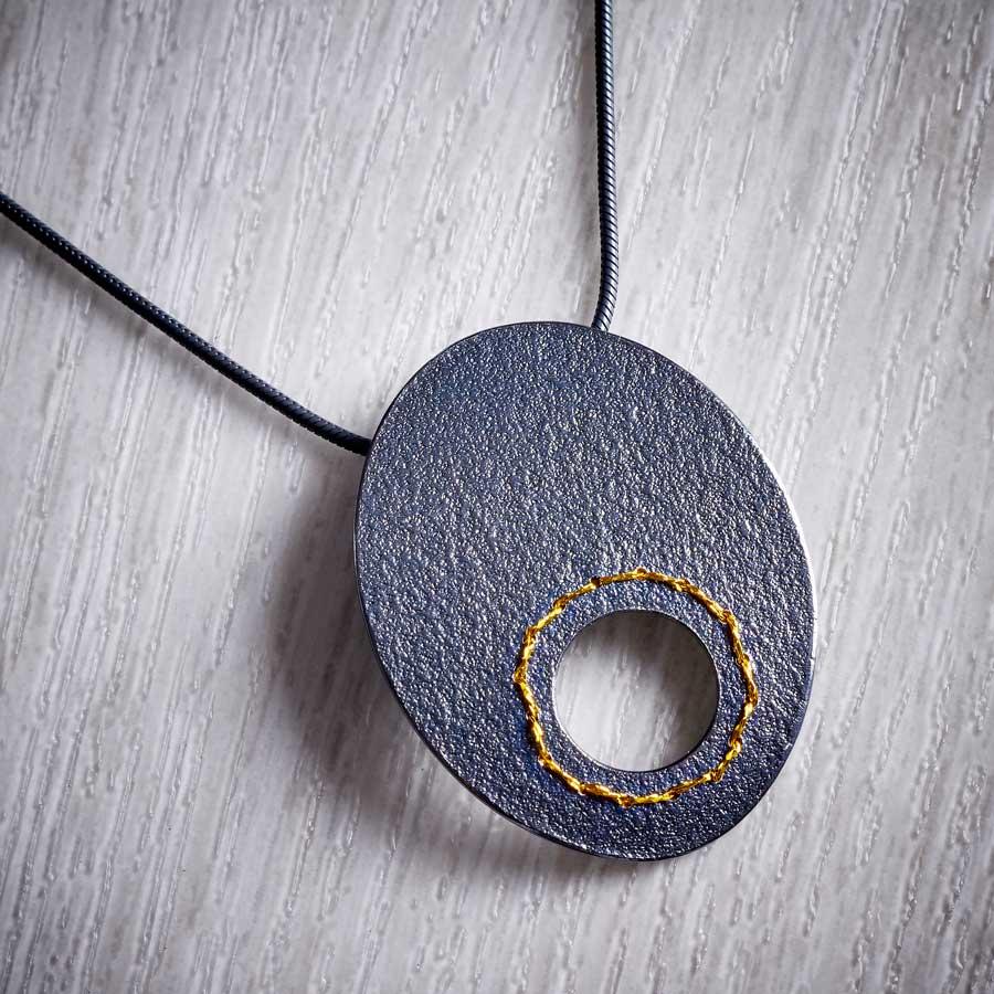 Oxidised (Black) Silver Cut-out circle Necklace sewn with Gold thread by Sara Bukumunhe (SUNH)-2