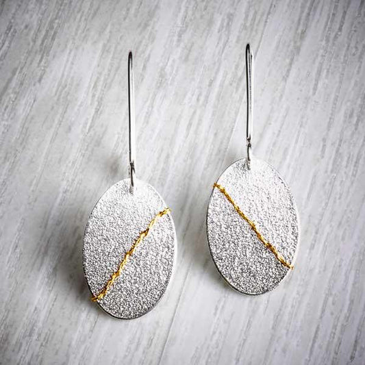 Silver Dangly Earrings Sewn with Gold Thread by Sara Bukumunhe. Image property of THE JEWELLERY MAKERS.-0