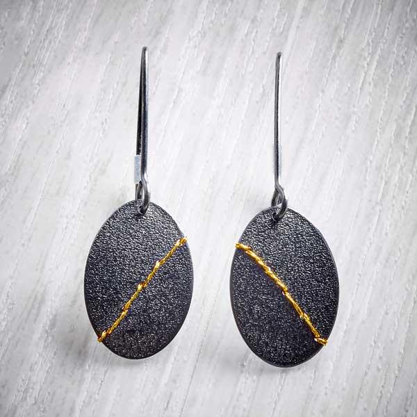 Oxidised (Blackened) Silver Dangly Earrings Sewn with Gold Thread by Sara Bukumunhe. Image property of THE JEWELLERY MAKERS.-0