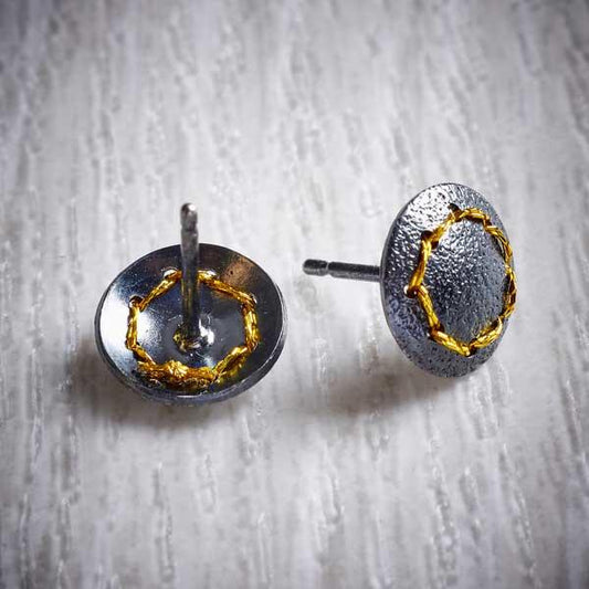 Oxidised (Blackened) Silver, Round Stud Earrings, with Gold Thread Circle by Sara Bukumunhe. Image property image of THE JEWELLERY MAKERS.-1