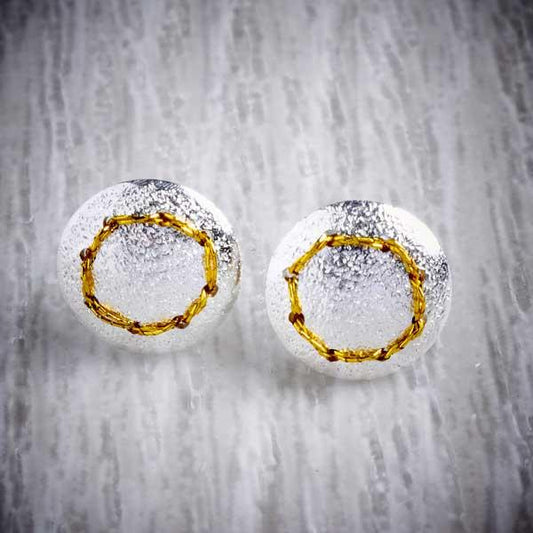 Handmade silver stud earrings sewn up with a circle of gold thread-0